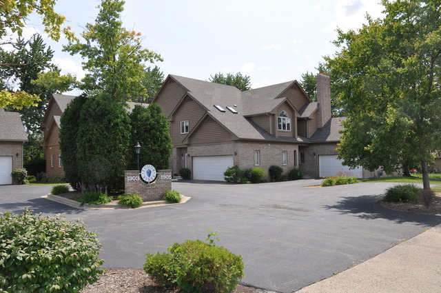 1905 Plainfield Road, Unit C Downers Grove, IL 60516 - Photo 19 of 20 a front view of a house with a yard