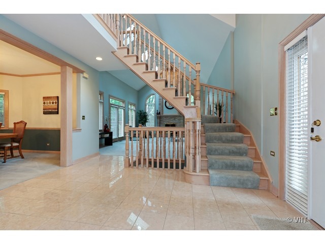 1905 Plainfield Road, Unit C Downers Grove, IL 60516 - Photo 2 of 20 a view of entryway and hall with wooden floor