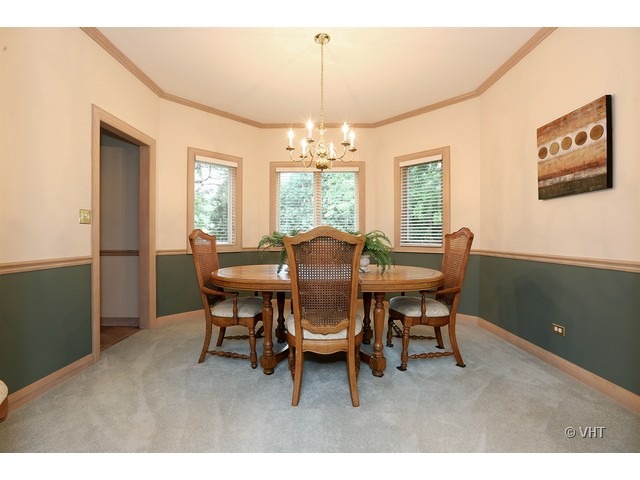 1905 Plainfield Road, Unit C Downers Grove, IL 60516 - Photo 5 of 20 a view of a dining room with furniture window and outside view