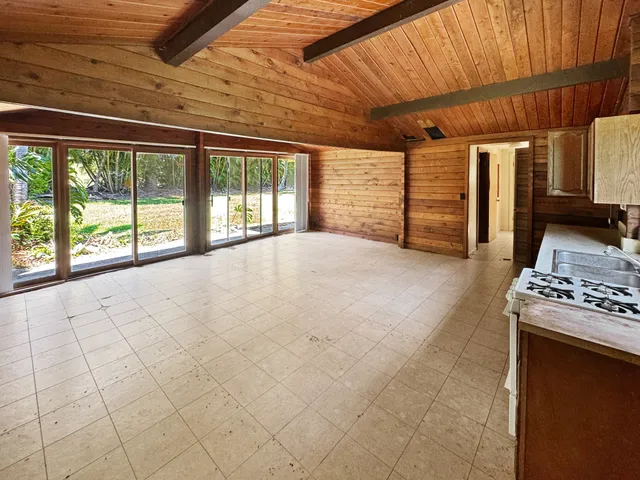 a bathroom with a sink mirror vanity and toilet