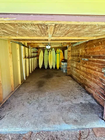 a view of a field of grass and trees
