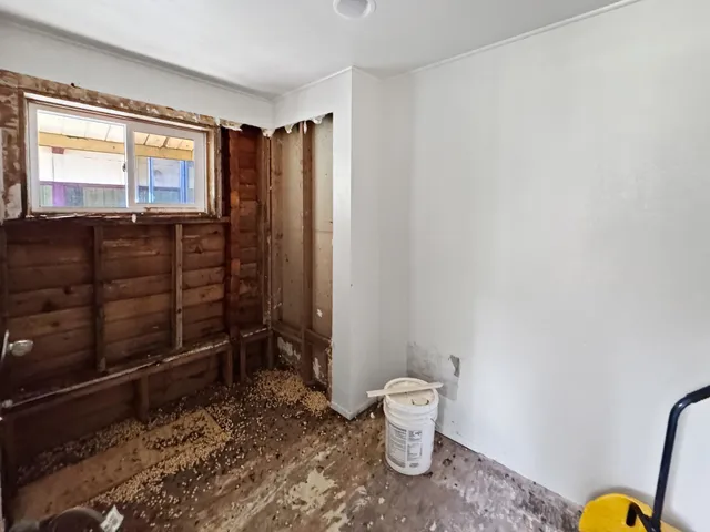 an empty room with windows