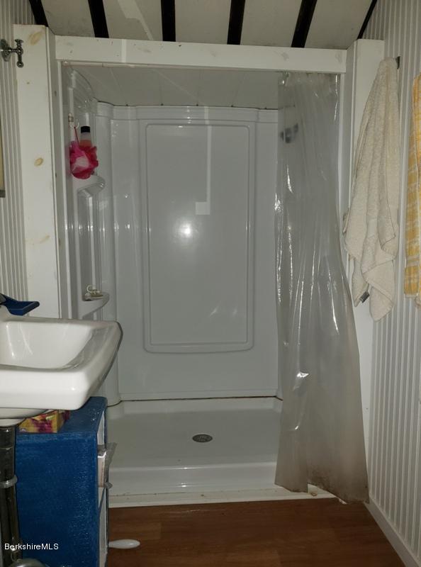 143 Sandisfield Road Monterey, MA 01245 - Photo 13 of 16 a bathroom with a shower