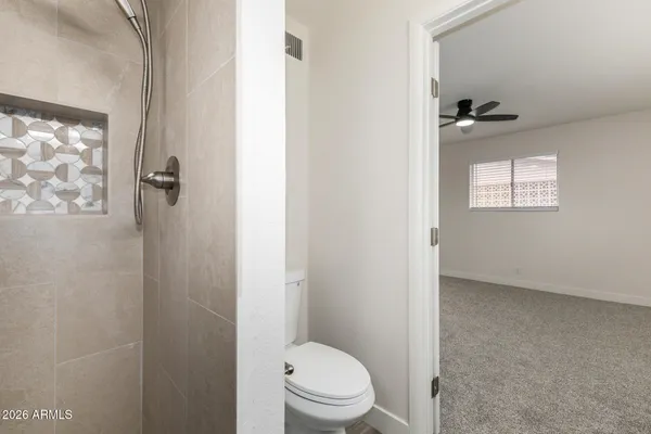 a bathroom with a toilet