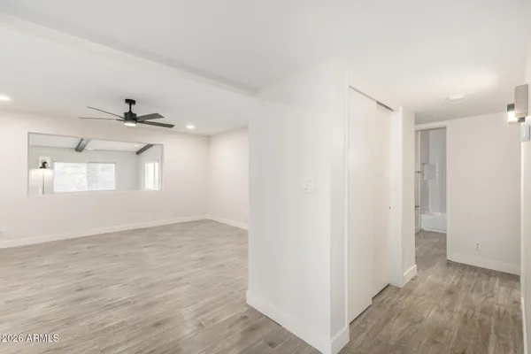 a view of an empty room and window