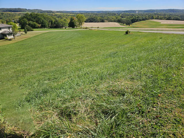 104 West Guilford Road Galena, IL 61036 - Photo 6 of 21 a view of a green field with lawn chairs