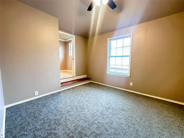 a kitchen with stainless steel appliances granite countertop a refrigerator a stove and a sink