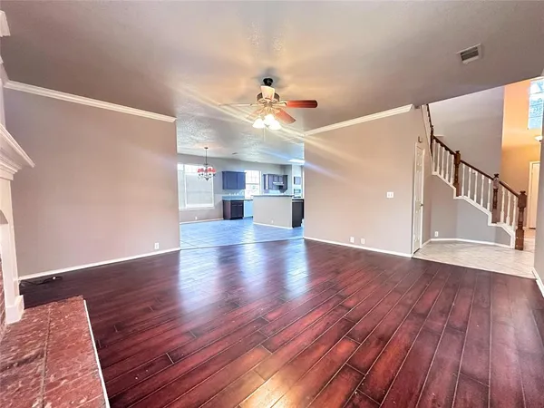 a view of a kitchen with furniture and a kitchen