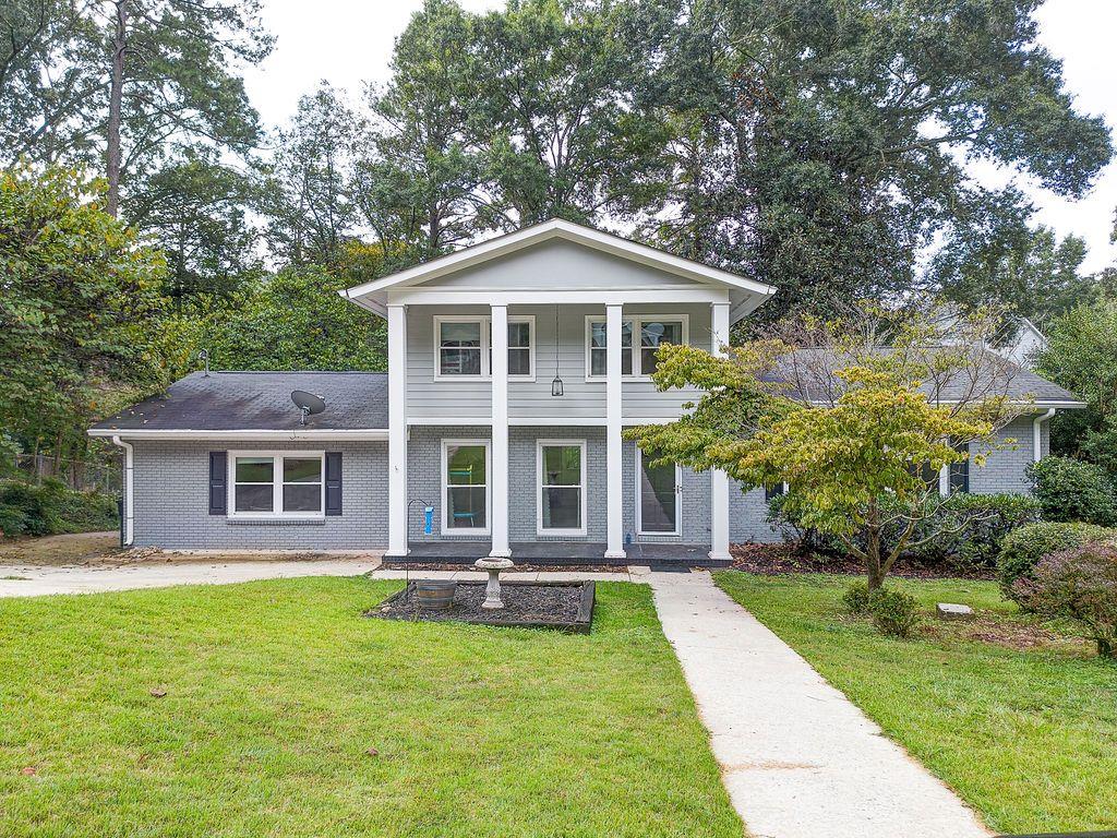 14 Riverview Road Southeast Rome, GA 30161 - Photo 1 of 1 a front view of a house with a yard