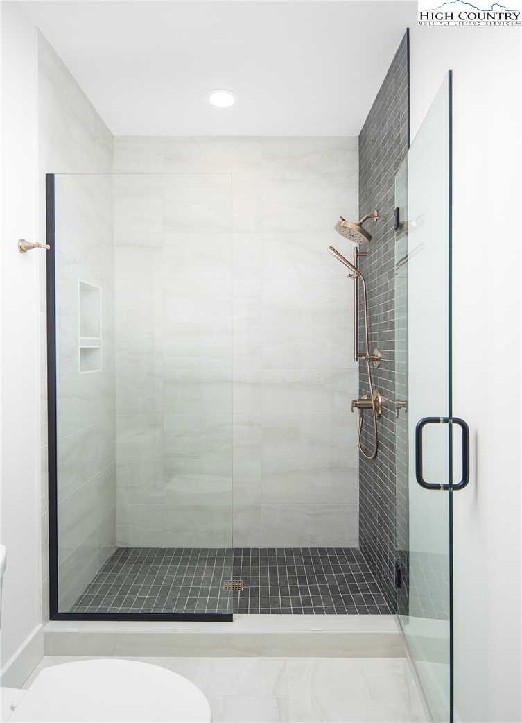 359 Calico Court Boone, NC 28607 - Photo 31 of 50 a bathroom with a shower
