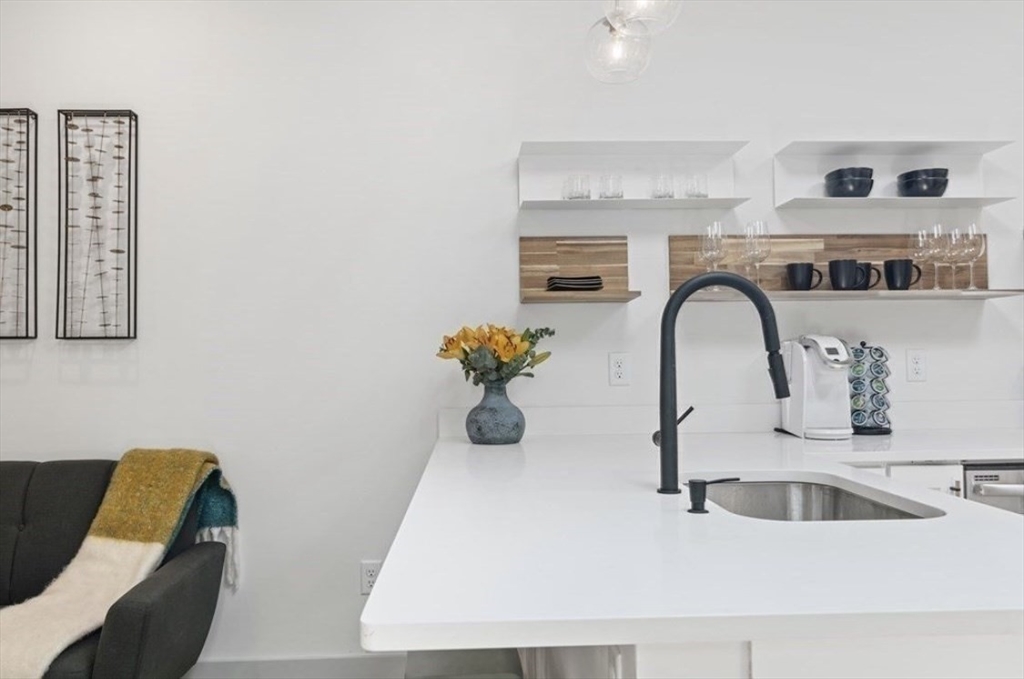43 Wordsworth Street, Unit 1 Boston, MA 02128 - Photo 9 of 19 a bathroom with a sink and a mirror