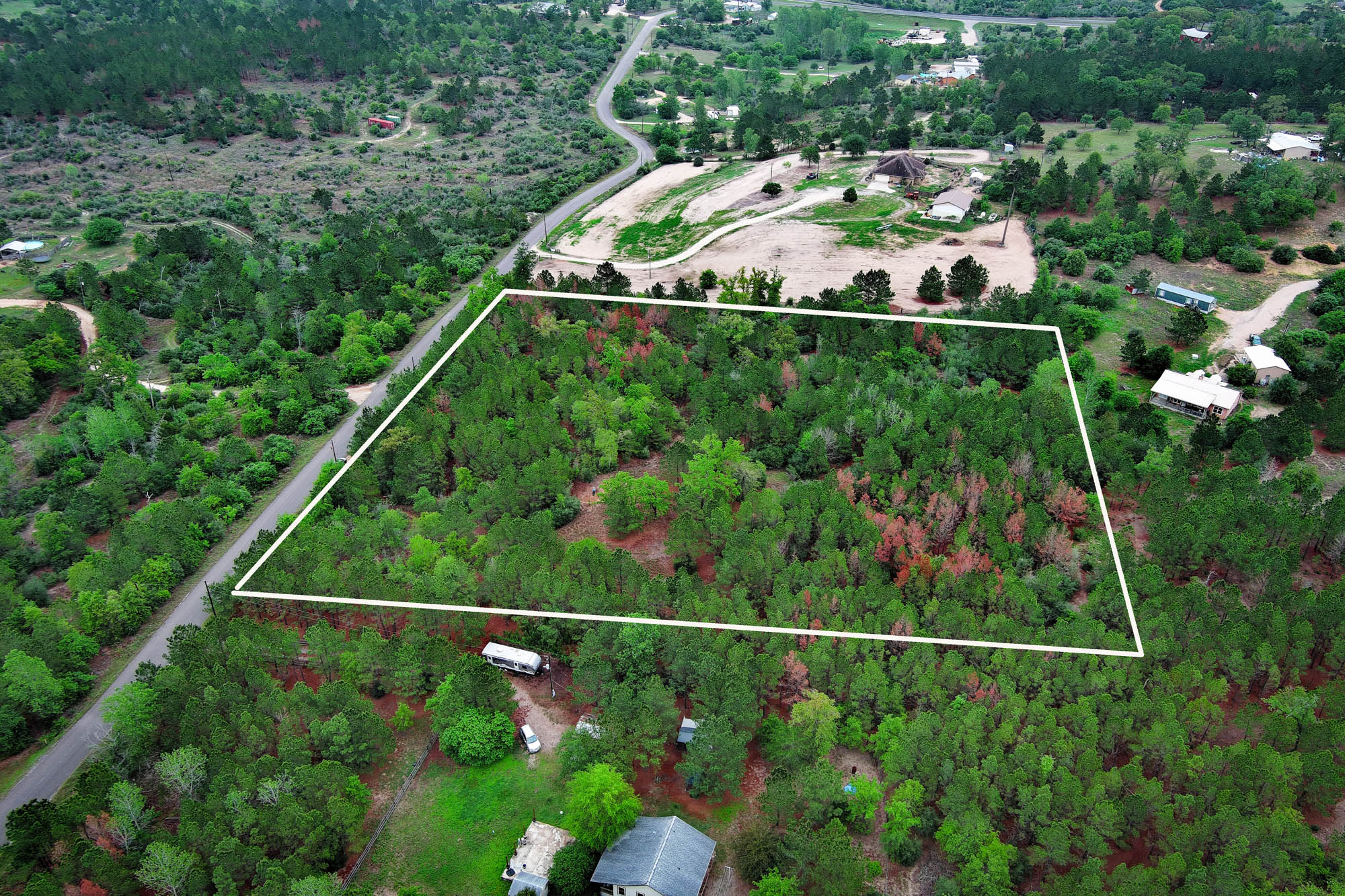 453 Kelley Road East Bastrop, TX 78602 - Photo 19 of 20 an aerial view of house with yard