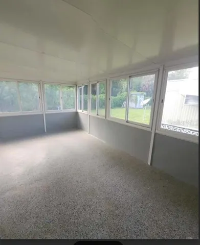 a view of empty room with front door