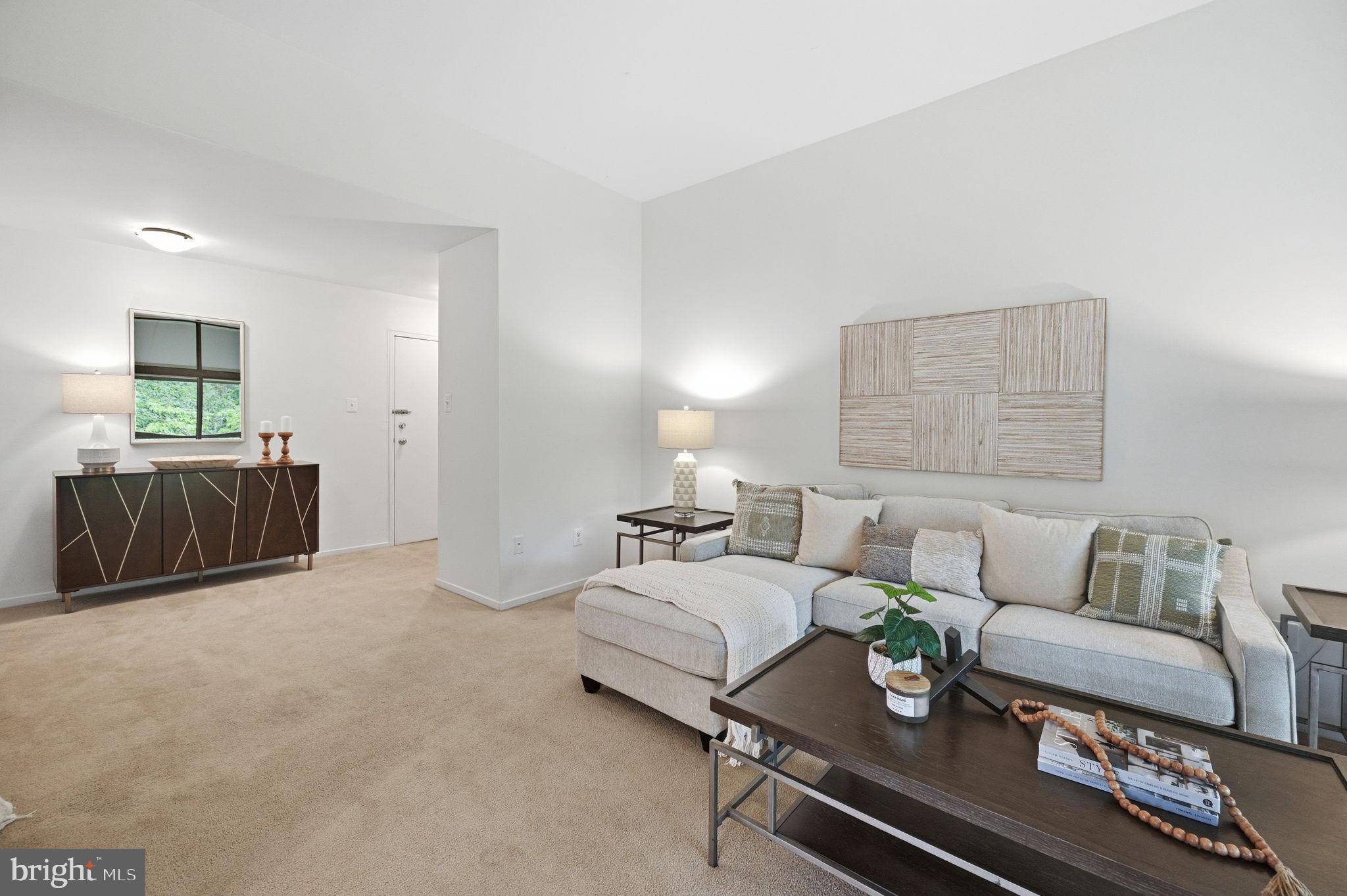 1659 Parkcrest Circle, Unit C Reston, VA 20190 - Photo 6 of 31 a living room with furniture and a lamp