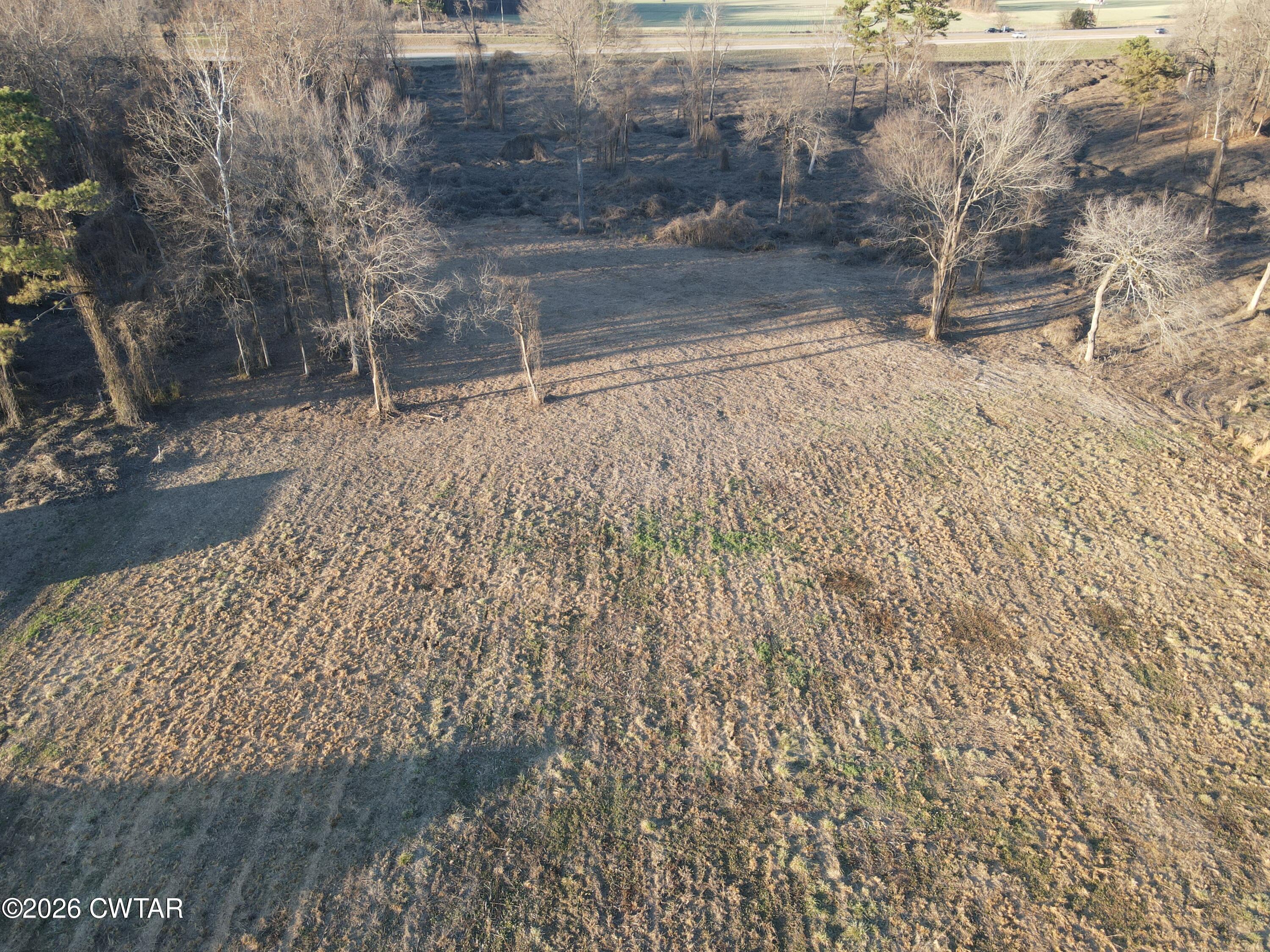 325 Upper Browns Church Road Jackson, TN 38305 - Photo 4 of 10 a view of a backyard of the house