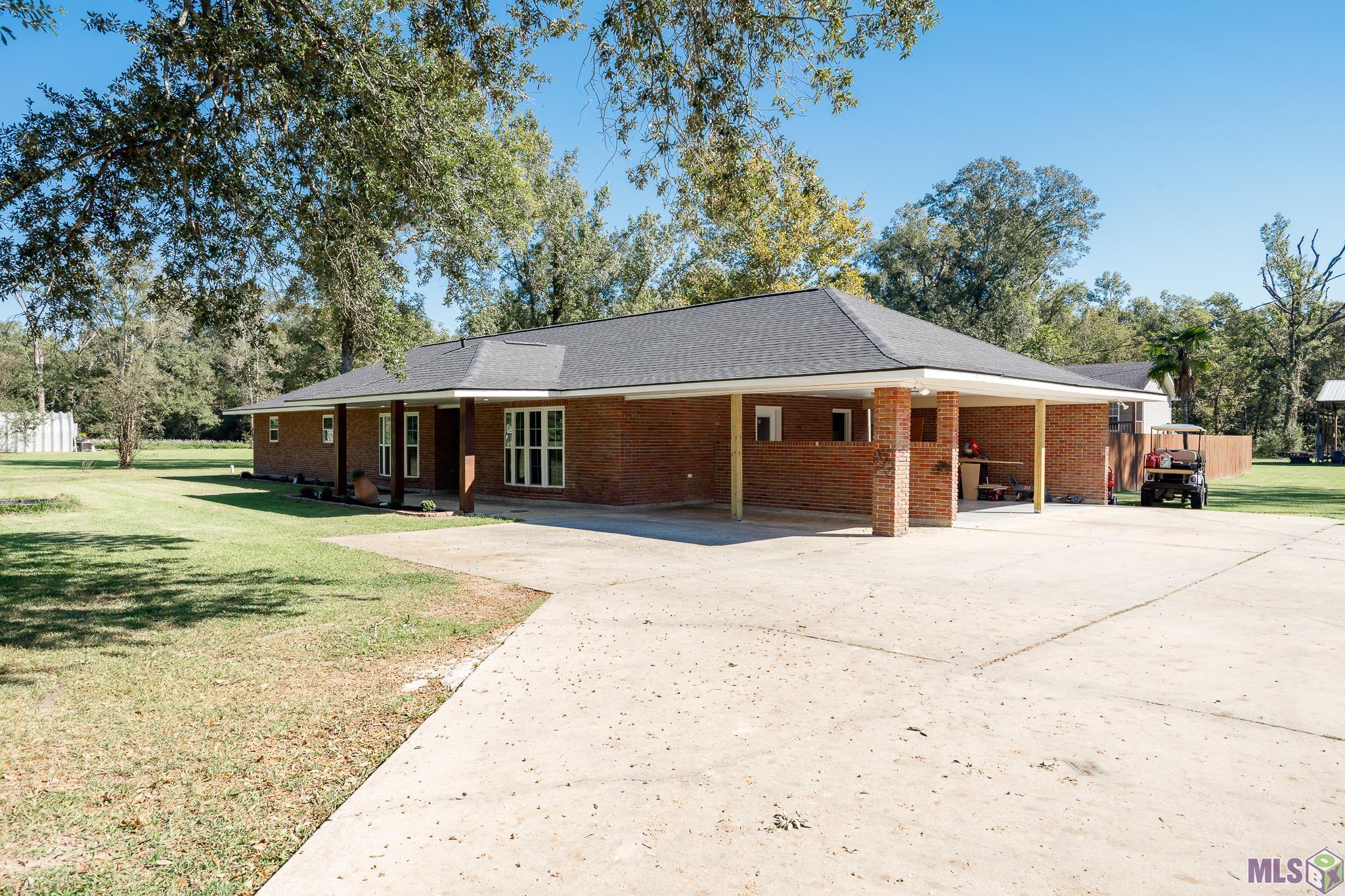 11102 Savoy Road St. Amant, LA 70774 - Photo 3 of 41 Carport Parking with Ample Parking