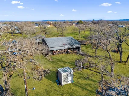 a view of a lake with a yard
