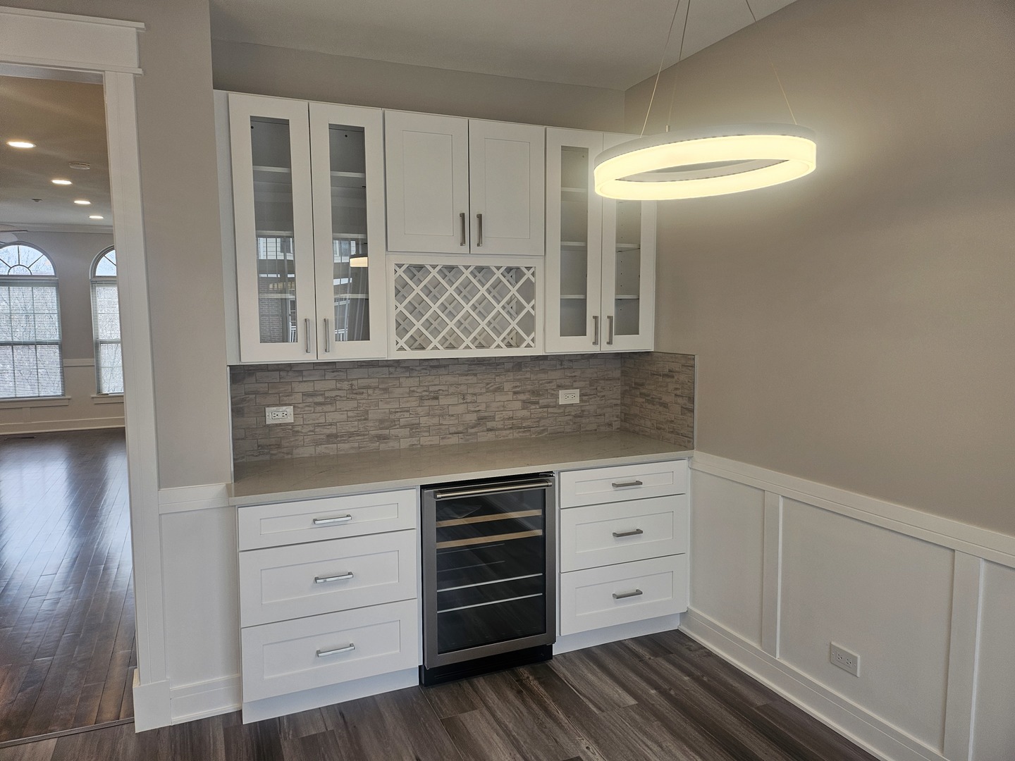447 Prestwick Lane Wheeling, IL 60090 - Photo 3 of 17 a kitchen with white cabinets and window