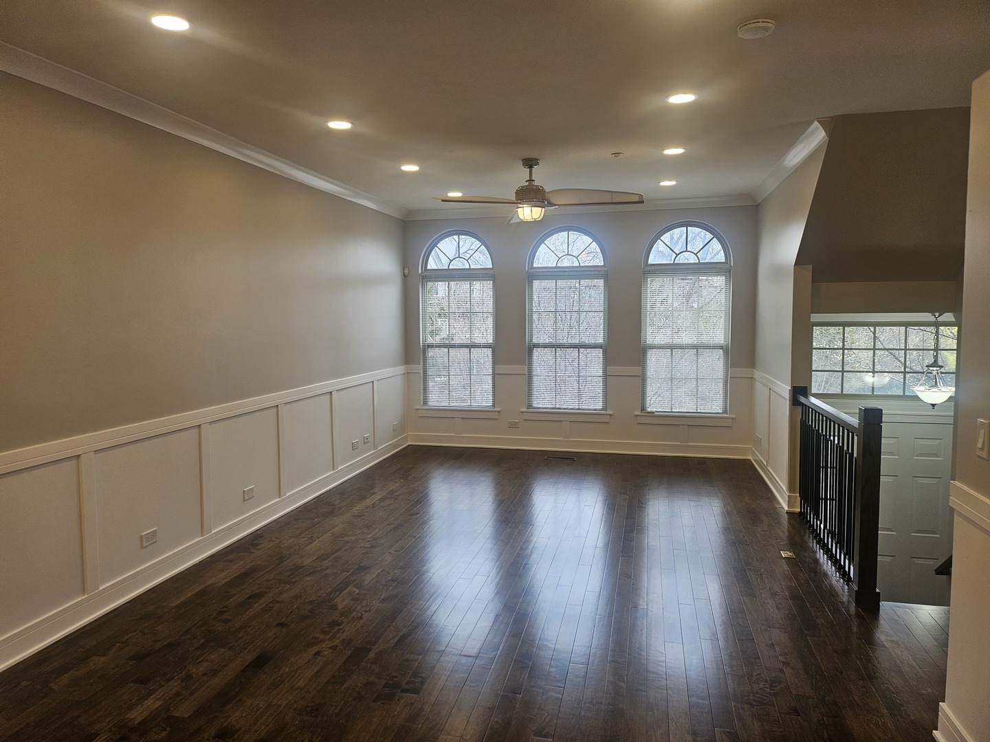 447 Prestwick Lane Wheeling, IL 60090 - Photo 5 of 17 an empty room with wooden floor and windows
