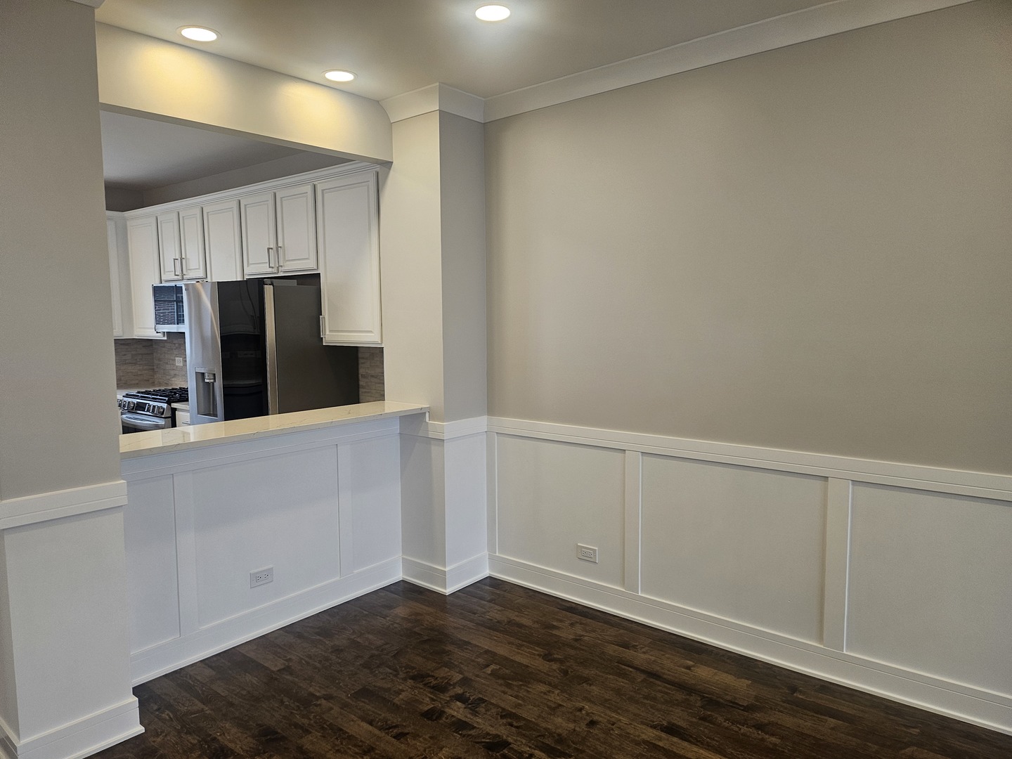 447 Prestwick Lane Wheeling, IL 60090 - Photo 6 of 17 a view of an empty room with wooden floor