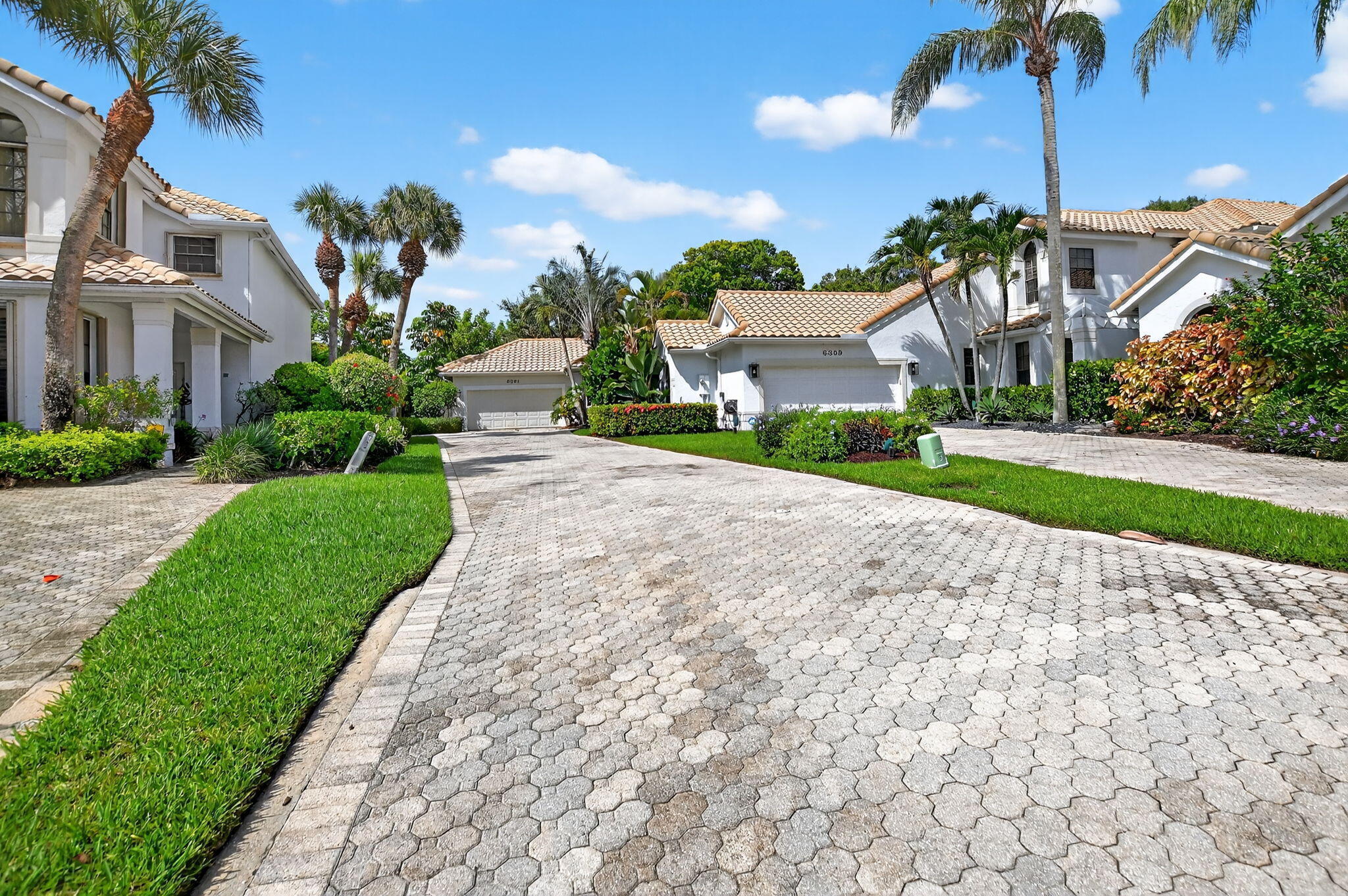 6301 Northwest 25th Way Boca Raton, FL 33496 - Photo 2 of 59 Long driveway