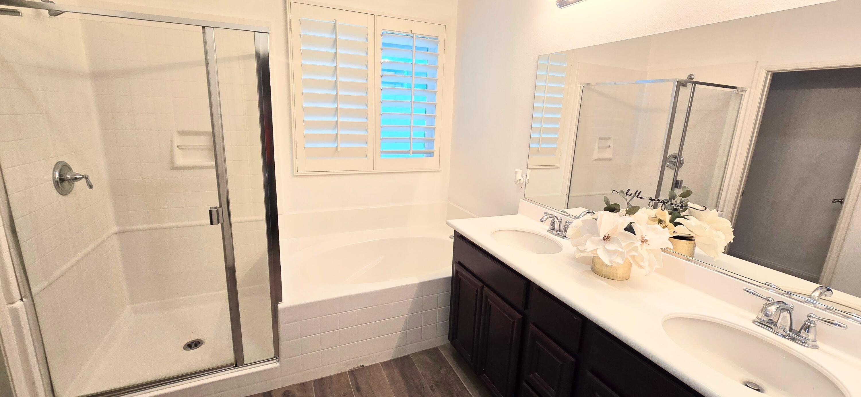 49818 Minelli Street Indio, CA 92201 - Photo 6 of 11 a bathroom with a sink and a mirror