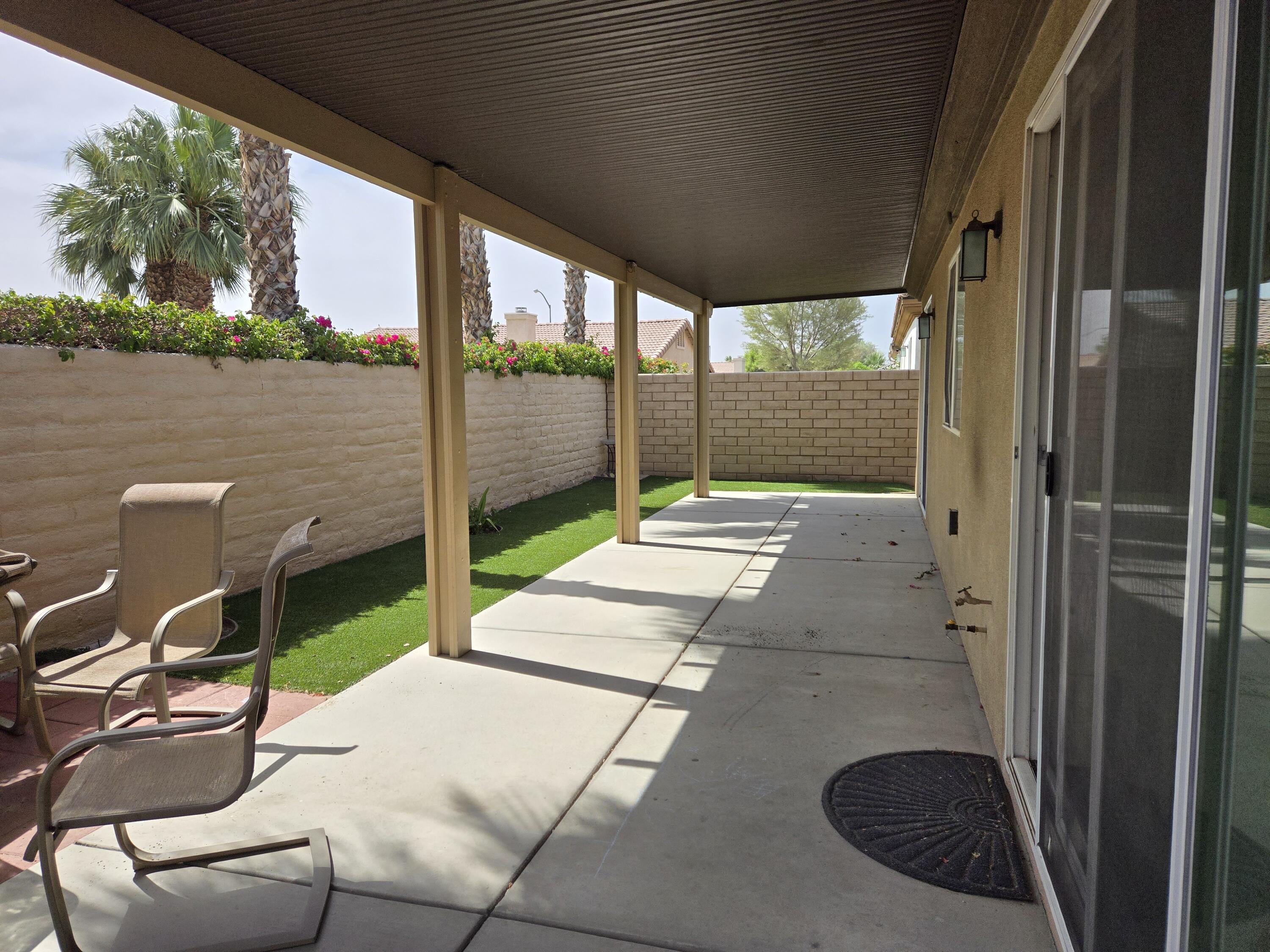49818 Minelli Street Indio, CA 92201 - Photo 9 of 11 a view of yard from a balcony