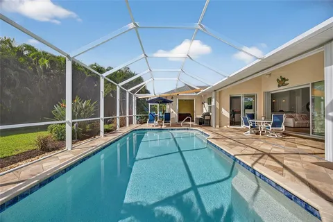a view of a house with a swimming pool