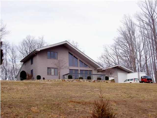 514 Rainbow Ridge Road Faber, VA 22938 - Photo 2 of 8 a front view of house with yard and trees in the background