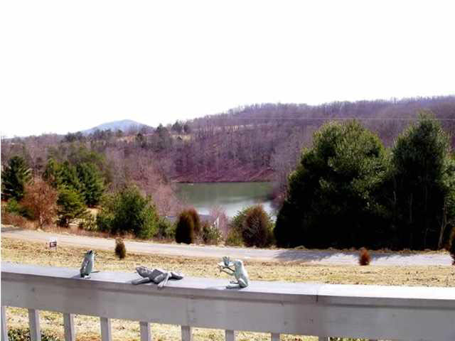 514 Rainbow Ridge Road Faber, VA 22938 - Photo 3 of 8 a view of a lake with a mountain view