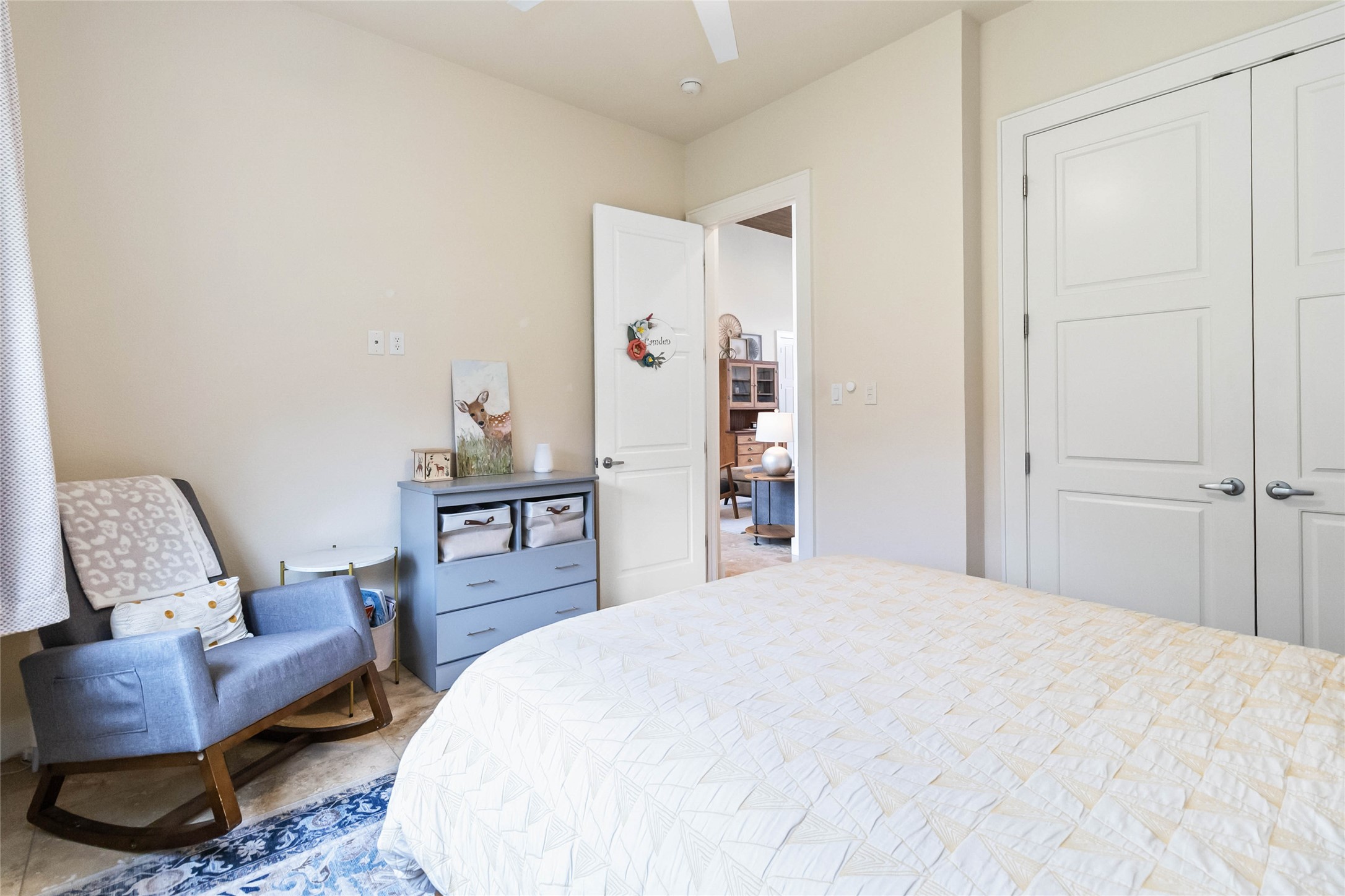 129 Powder Horn Road Bastrop, TX 78602 - Photo 15 of 27 Bedroom featuring a closet and ceiling fan