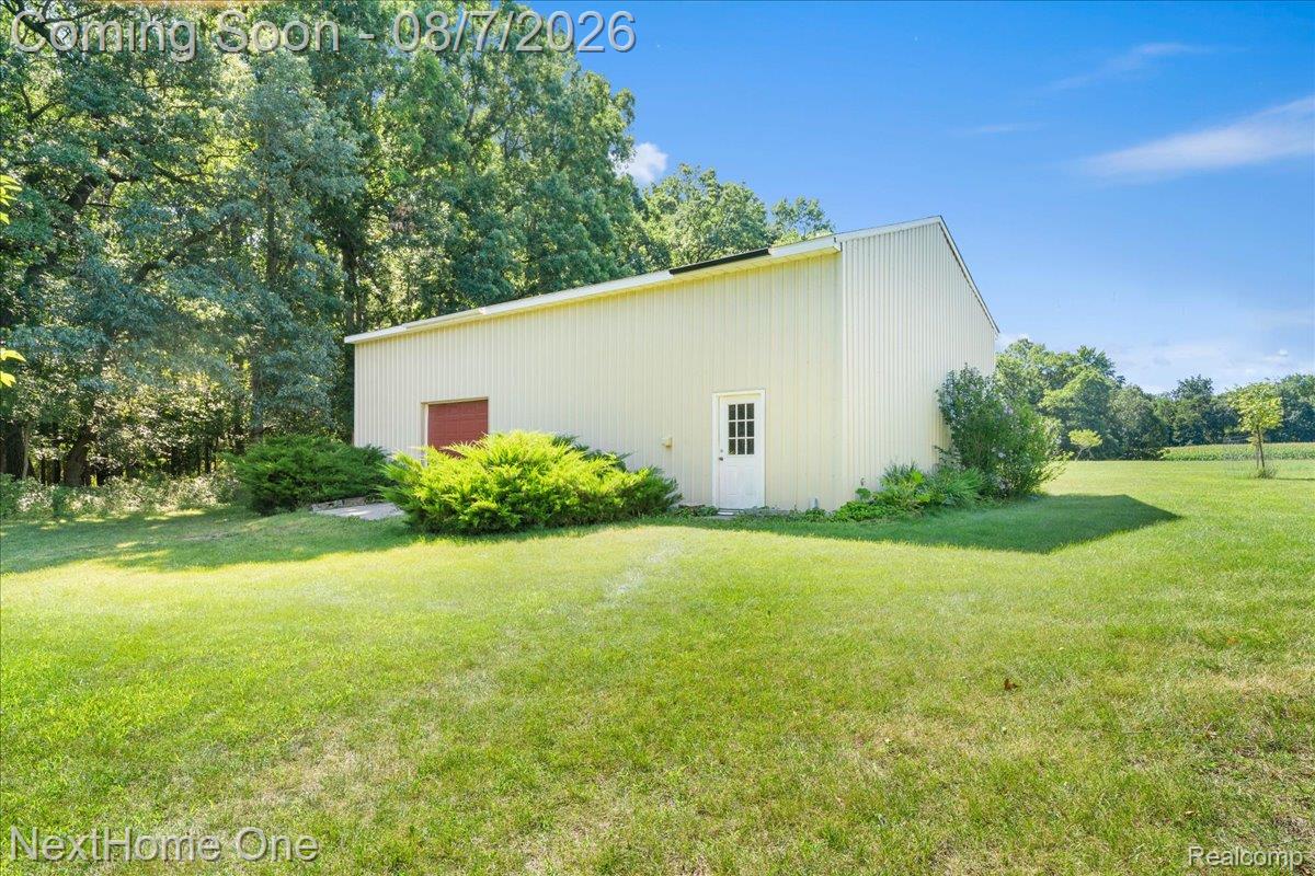 6260 Faussett Road Howell, MI 48855 - Photo 3 of 44 48-by-32 pole barn with power, concrete, and storage loft