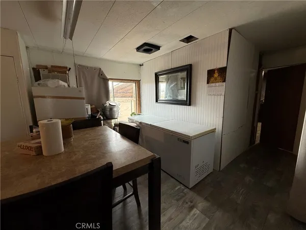 a kitchen with sink cabinets and window