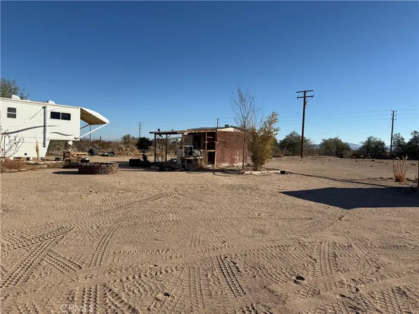 a view of street with parked cars