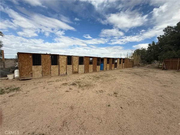 a view of swimming pool with a yard