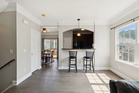 a view of a livingroom with furniture and window