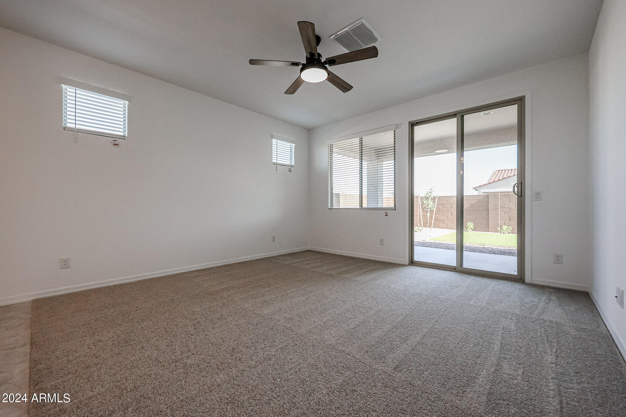 8907 West Colter Street Glendale, AZ 85305 - Photo 13 of 44 a view of an empty room with a window