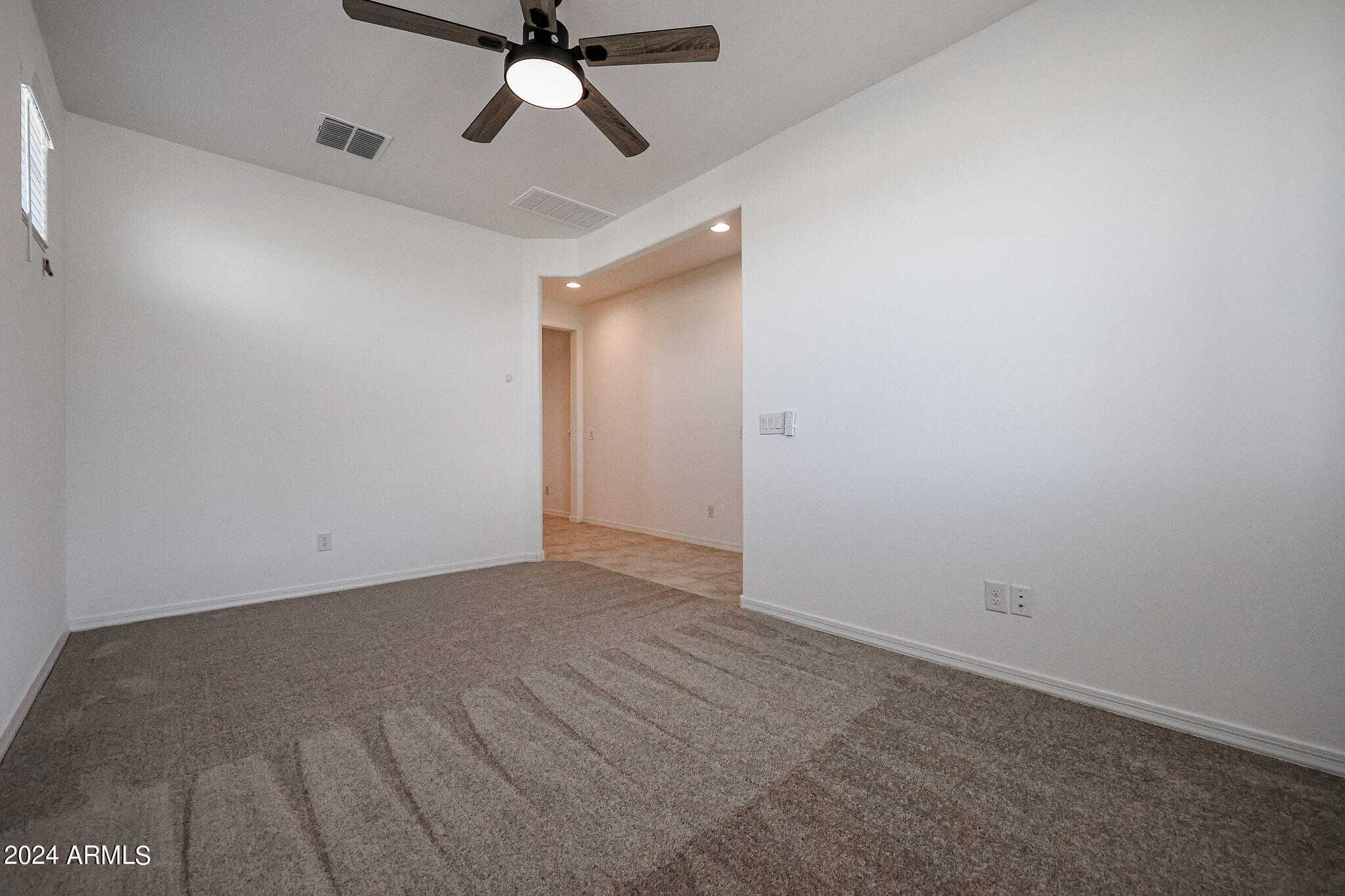 8907 West Colter Street Glendale, AZ 85305 - Photo 15 of 44 a view of an empty room