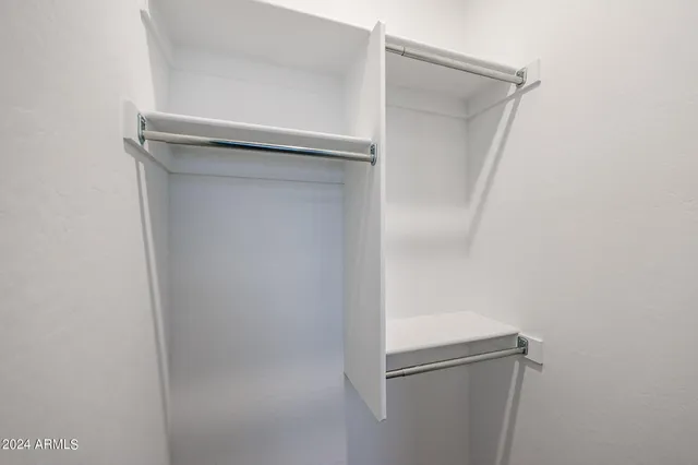 a bathroom with a sink a vanity and mirror