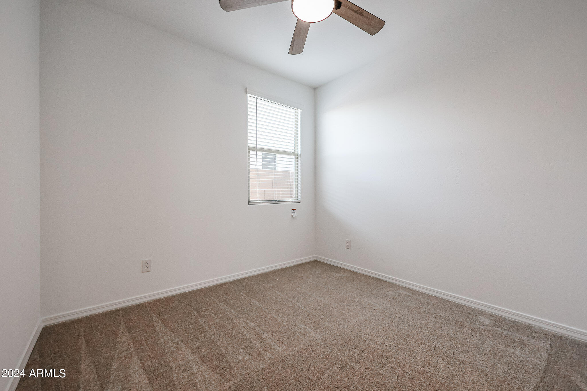 8907 West Colter Street Glendale, AZ 85305 - Photo 28 of 44 an empty room with a window