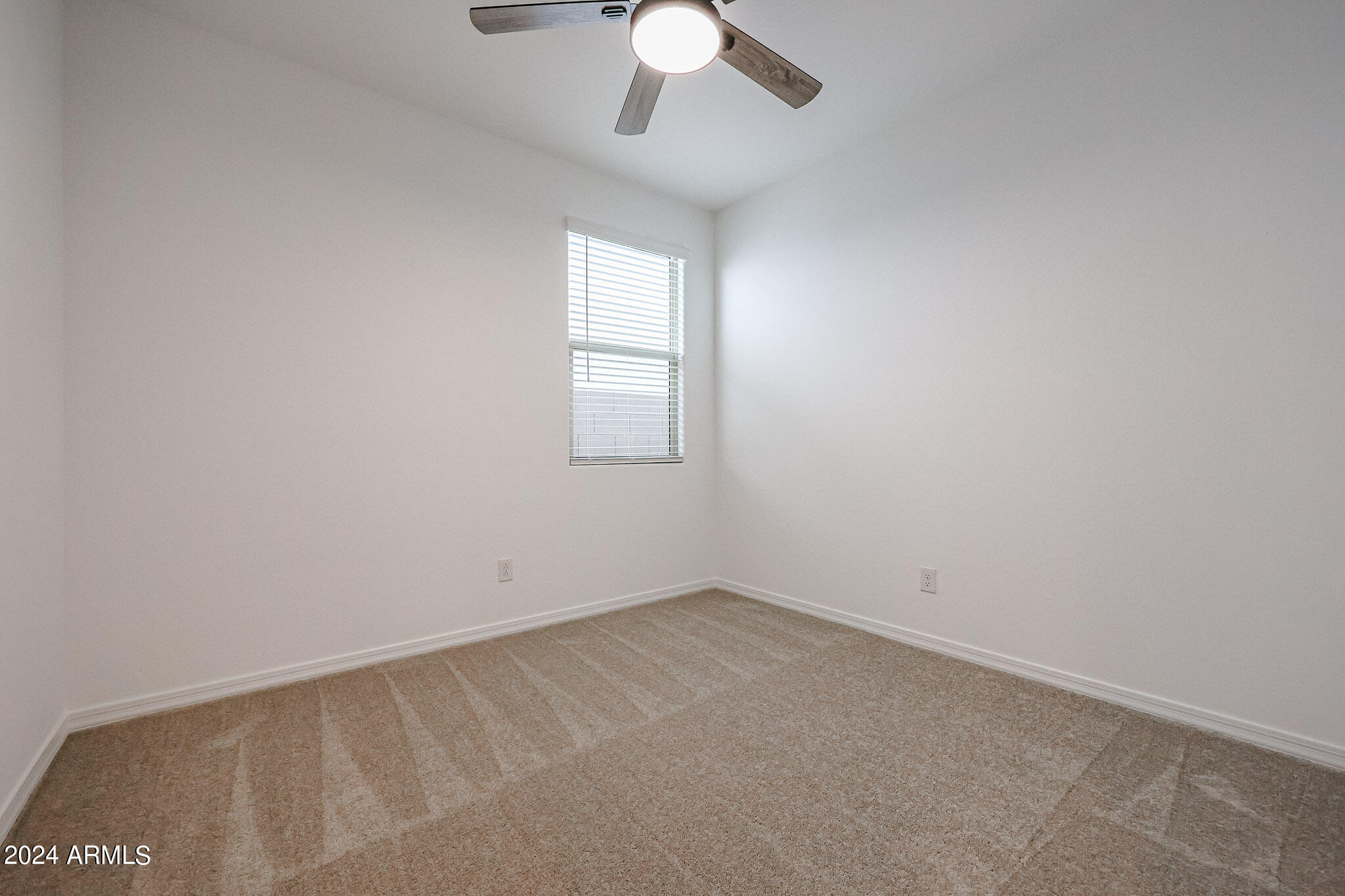 8907 West Colter Street Glendale, AZ 85305 - Photo 31 of 44 an empty room with a window