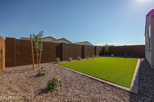 a bathroom with a sink double vanity and a bathtub