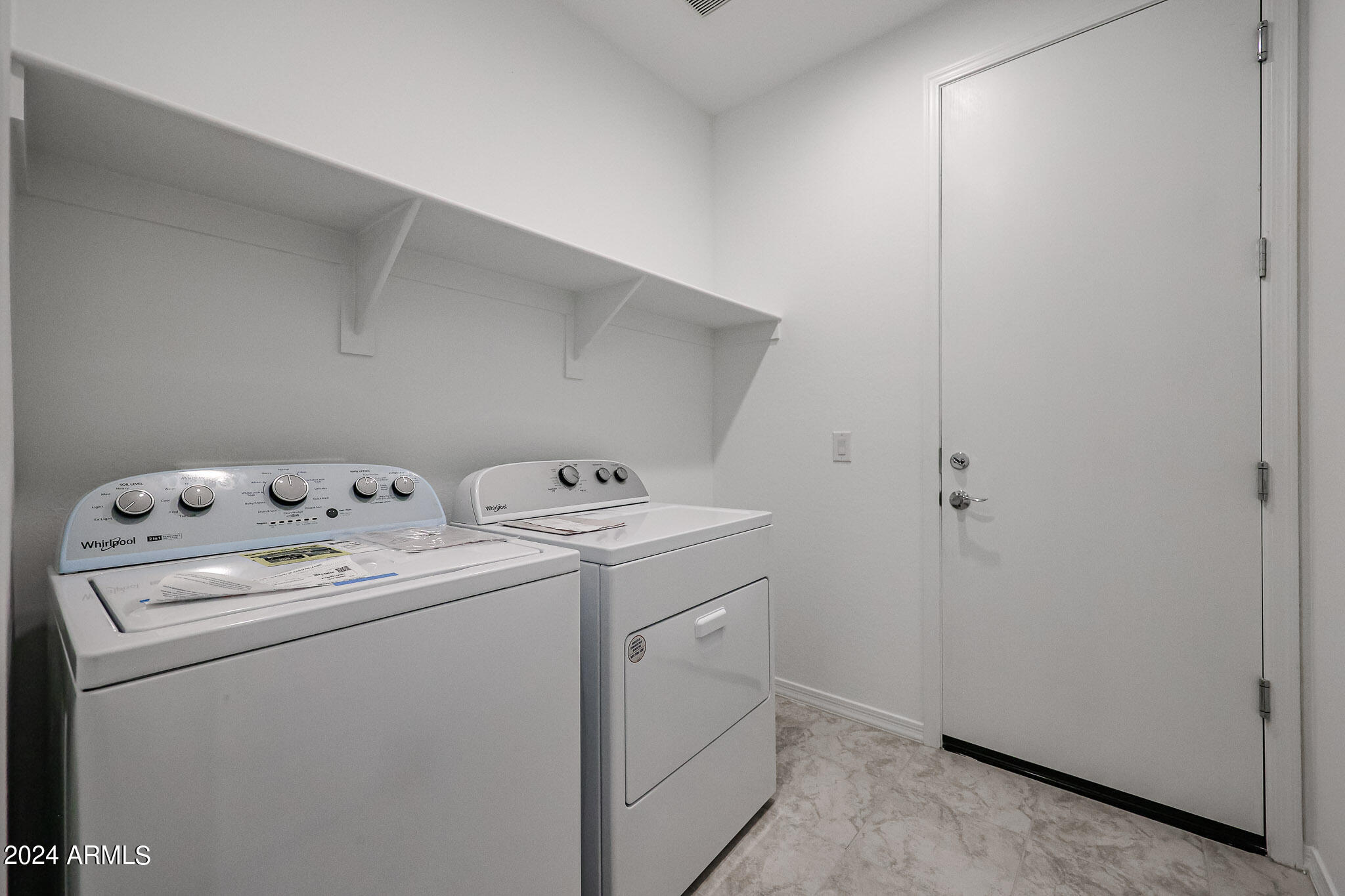 8907 West Colter Street Glendale, AZ 85305 - Photo 38 of 44 a utility room with dryer and washer