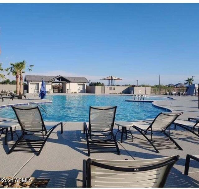 8907 West Colter Street Glendale, AZ 85305 - Photo 41 of 44 a view of a outdoor space with seating area