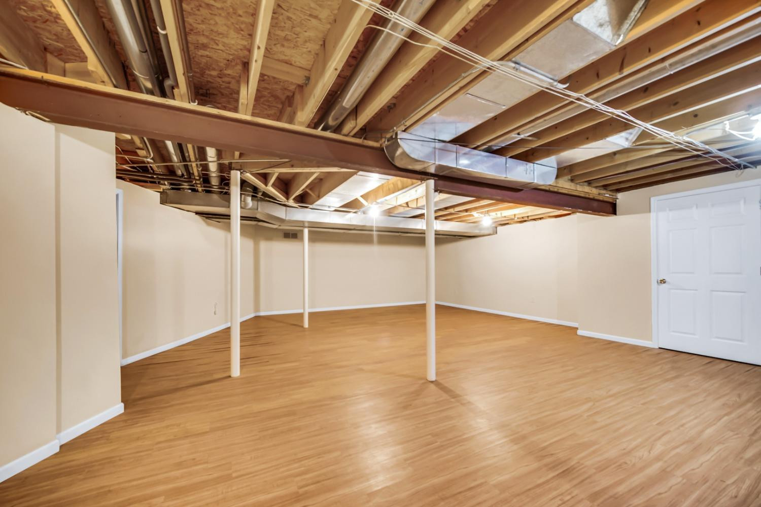 8408 Castle Drive Munster, IN 46321 - Photo 23 of 28 an empty room with wooden floor