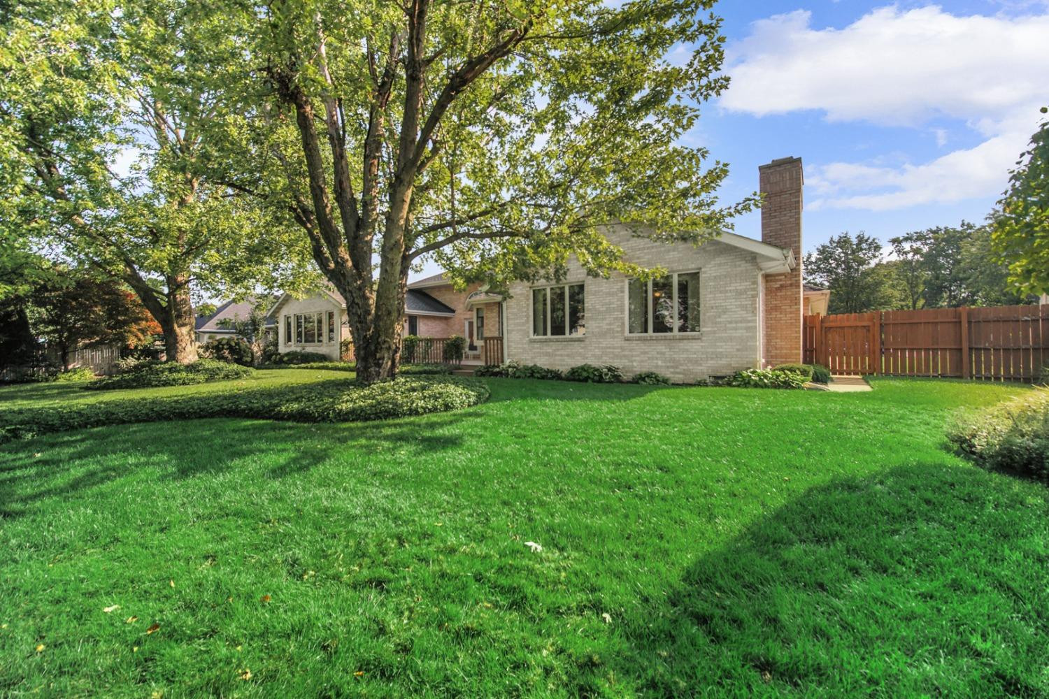 8408 Castle Drive Munster, IN 46321 - Photo 26 of 28 a view of a house with backyard and garden