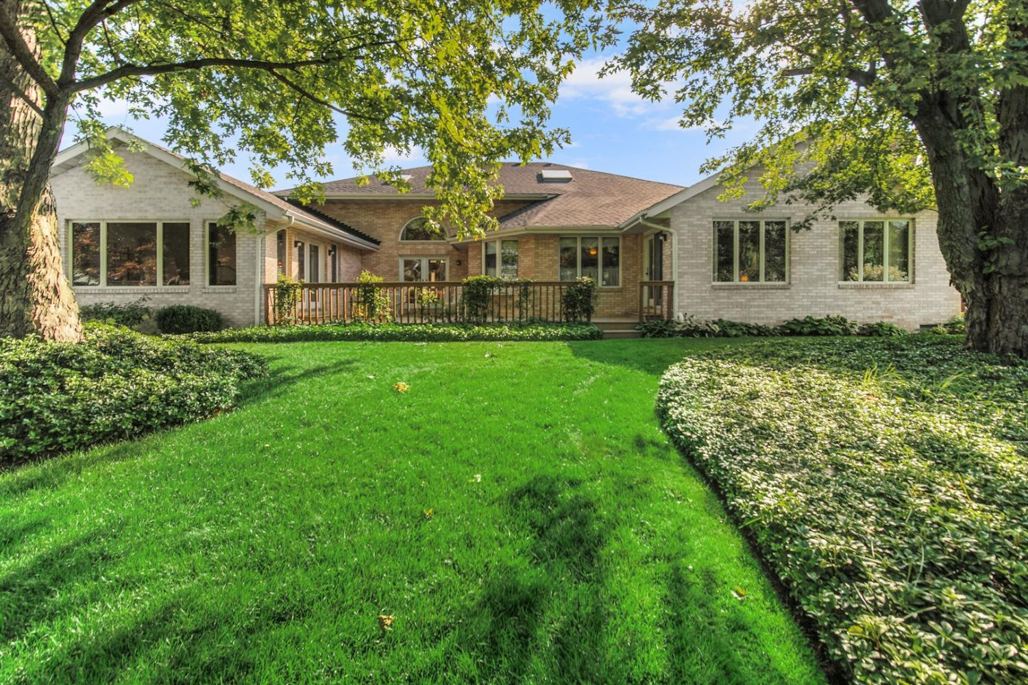 8408 Castle Drive Munster, IN 46321 - Photo 27 of 28 a front view of a house with a garden