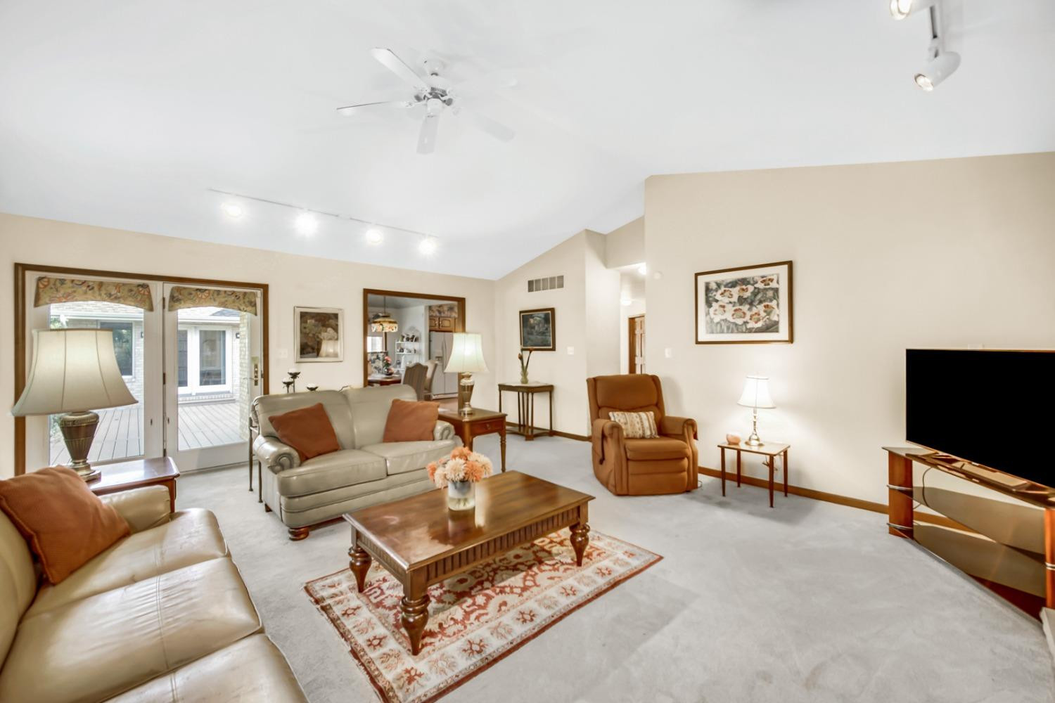 8408 Castle Drive Munster, IN 46321 - Photo 8 of 28 a living room with furniture and a flat screen tv