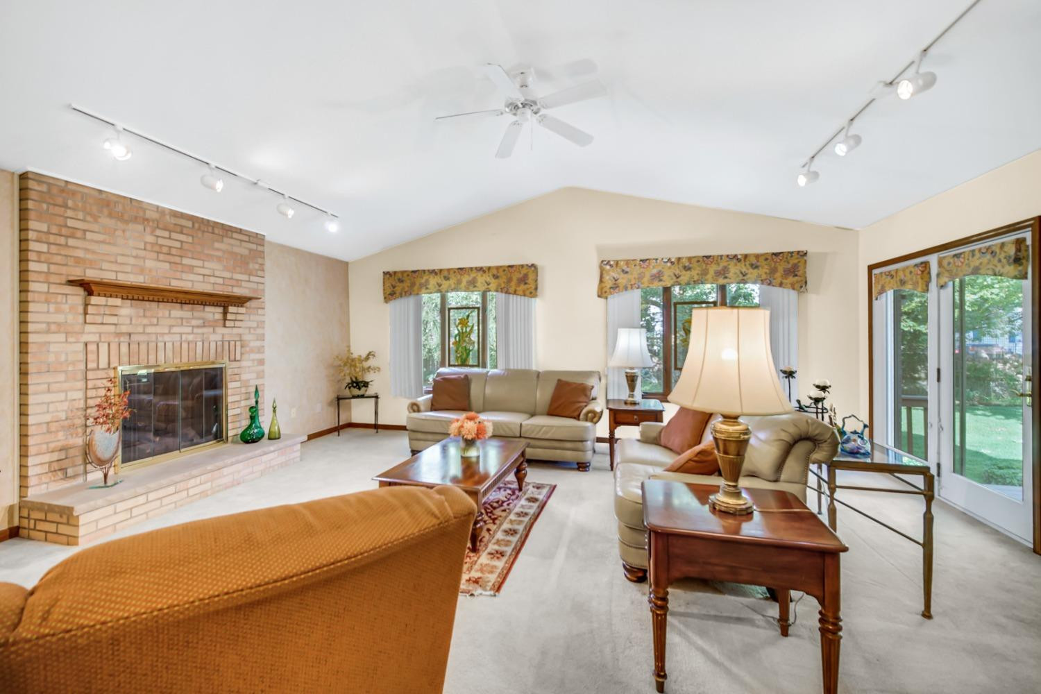8408 Castle Drive Munster, IN 46321 - Photo 9 of 28 a living room with furniture and a large window