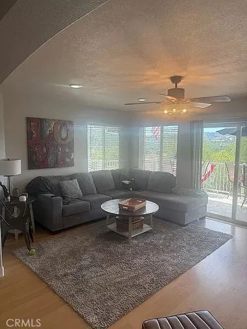 a bedroom with a bed and a large mirror